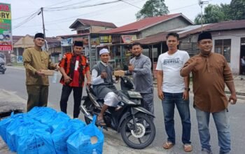 Bukan Sekadar Organisasi, KOTI MPC Pemuda Pancasila Pekanbaru Rutin Berbagi 150 Nasi Kotak